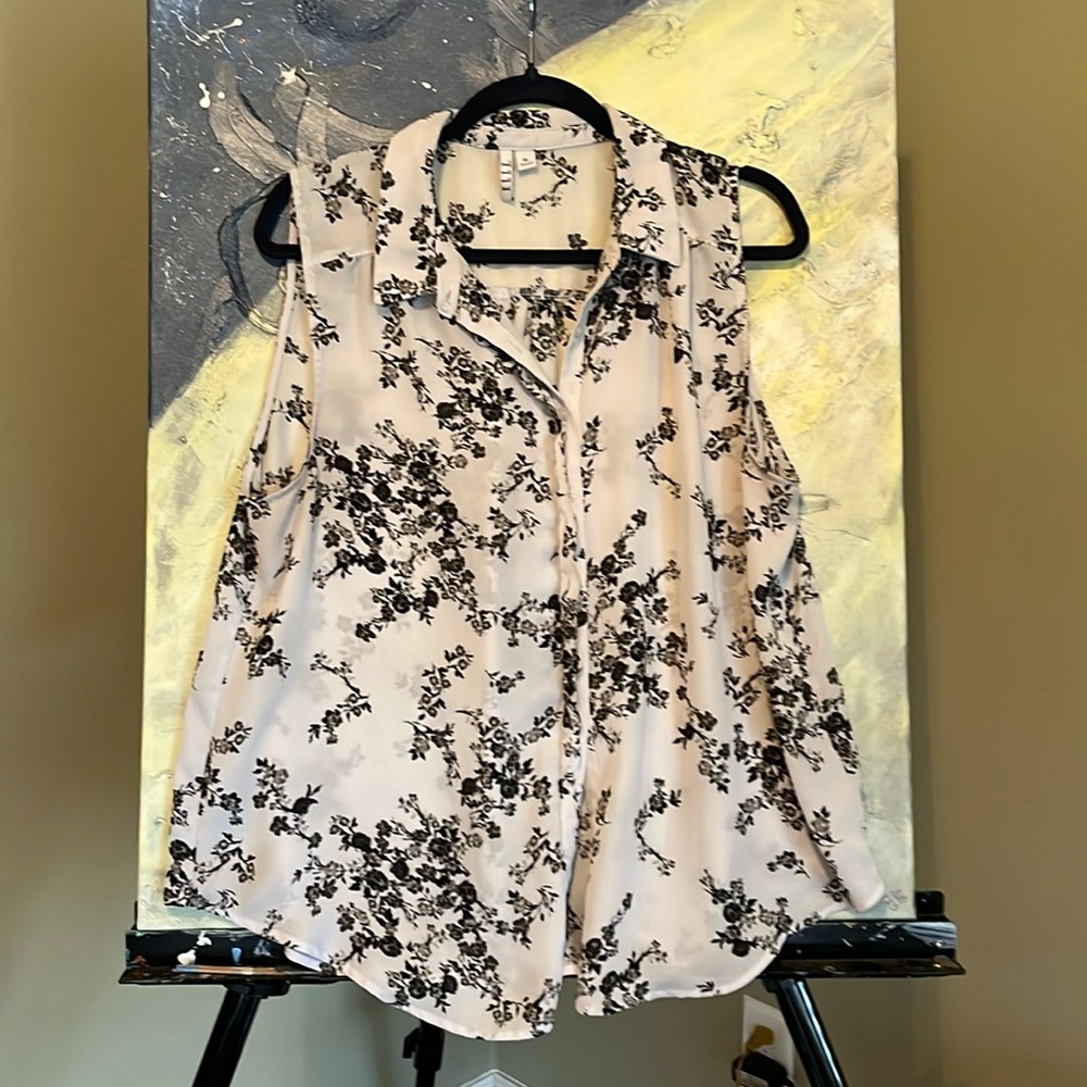 White sheer sleeveless top with black flower clusters
